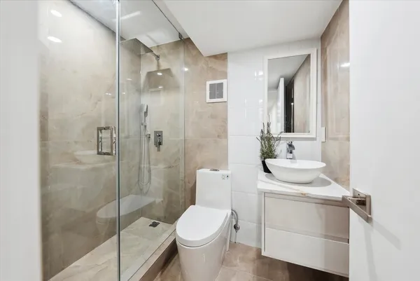 Family bathroom with custom vanity and mirror