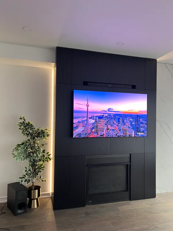 Stone-inspired MDF panels LED lighting media wall